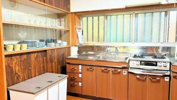 Fridge, microwave, stovetop, cookware/dishes/utensils