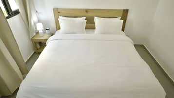 2 dormitorios, tabla de planchar con plancha, wifi y ropa de cama