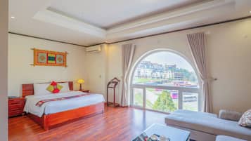 Deluxe Double or Twin Room | Minibar, in-room safe, desk, blackout curtains