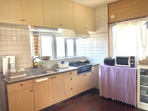 Fridge, microwave, stovetop, cookware/dishes/utensils
