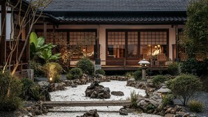 A traditional Japanese-style building with a tiled roof, wooden beams, and large windows. - Jingdezhen Xingshan City outside Jielu (Jingdezhen)