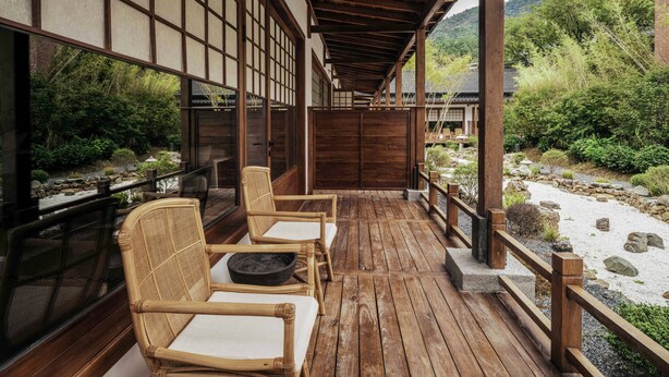 A traditional Japanese-style outdoor seating area with wooden flooring and tatami mat seating. - Jingdezhen Xingshan City outside Jielu (Jingdezhen)