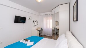 4 dormitorios, tabla de planchar con plancha, wifi gratis y ropa de cama