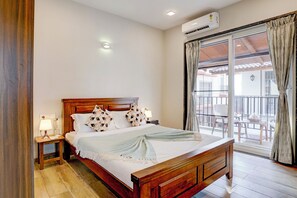 Deluxe Room, Non Smoking, Garden View | Blackout curtains, iron/ironing board, free WiFi - Elivaas Irene Jade 3BHK Pvt Pool Garden with Balconies (Mawal)