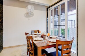Deluxe Room, Non Smoking, Garden View | Dining room - Elivaas Irene Jade 3BHK Pvt Pool Garden with Balconies (Mawal)