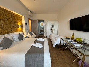 Superior Triple Room, Sea View | In-room safe, desk, iron/ironing board, free WiFi