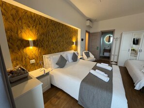 Superior Triple Room, Sea View | In-room safe, desk, iron/ironing board, free WiFi