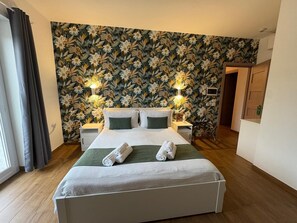 Superior Triple Room, Mountain View | In-room safe, desk, iron/ironing board, free WiFi