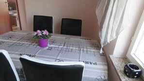 Apartment (One Bedroom Apartment with Balcony 1) | Dining room - Serene Barbat Escape With Just Minutes From the Beach (Rab)