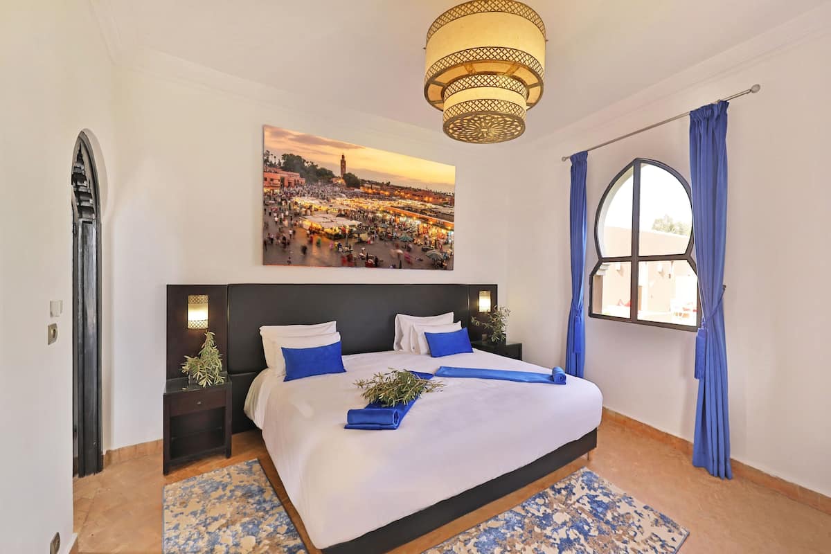 Deluxe Suite, Balcony, Pool View | 3 bedrooms, free WiFi