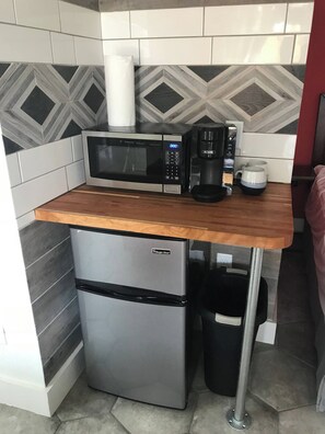 Signatur-studiolejlighed - 1 queensize-seng - terrasse | Privat tekøkken | Minikøleskab, mikrobølgeovn, kaffe-/temaskine, spisebord