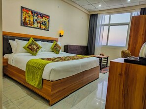 Desk, laptop workspace, blackout curtains, iron/ironing board