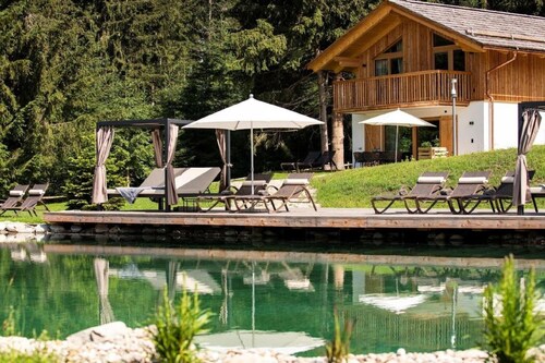 Nice chalet in Wölting with natural swimming pond