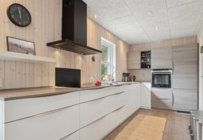 Fridge, microwave, dishwasher, cookware/dishes/utensils