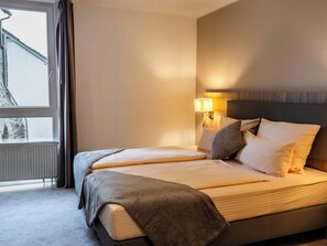 Literie hypoallergénique, coffres-forts dans les chambres, bureau