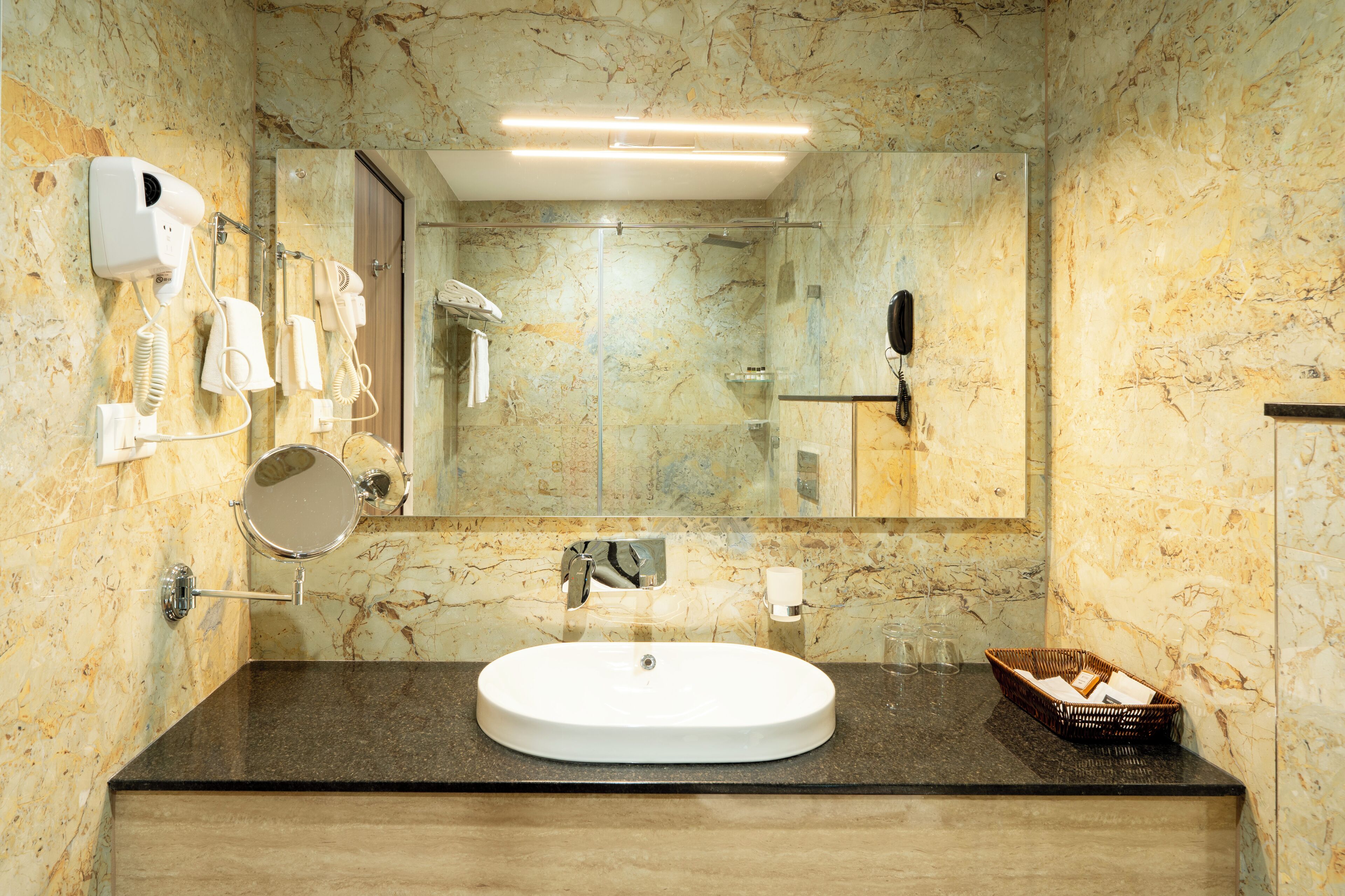 Separate tub and shower, hair dryer, slippers, towels