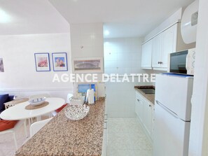 Microwave, coffee/tea maker, cookware/dishes/utensils