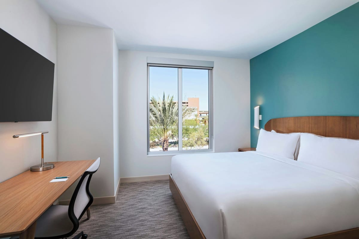 Premium bedding, Tempur-Pedic beds, desk, laptop workspace