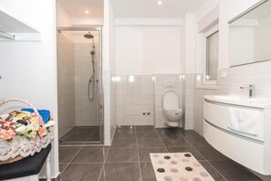 Hair dryer, towels, soap, toilet paper