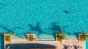 Indoor pool, seasonal outdoor pool, free pool cabanas, pool loungers