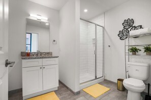 Shower, hair dryer, towels