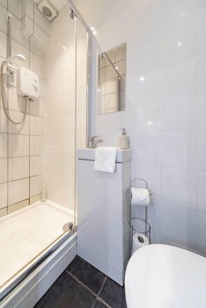 Shower, free toiletries, hair dryer, towels