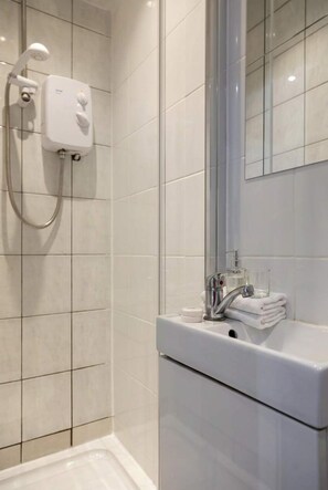 Shower, free toiletries, hair dryer, towels
