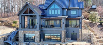 Endless Sunsets by Chatuge Home Concierge | Lakefront home with private dock, covered boat slip, sun deck, bar, fire pit, pool table, and kayaks. The perfect spot to relax, play, and enjoy unforgettable sunset views.
