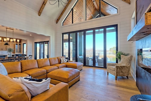 Endless Sunsets by Chatuge Home Concierge | Lakefront home with private dock, covered boat slip, sun deck, bar, fire pit, pool table, and kayaks. The perfect spot to relax, play, and enjoy unforgettable sunset views.