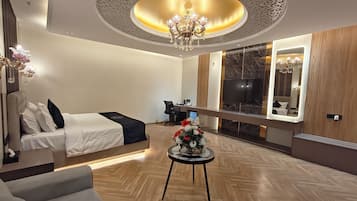 Superior Triple Room, City View | In-room safe, desk, laptop workspace, iron/ironing board