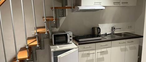 Fridge, microwave, coffee/tea maker, toaster