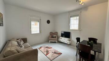 Appartement | Woonruimte | Een flatscreentelevisie