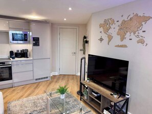 Apartment | Private kitchen | Fridge, microwave, oven, stovetop