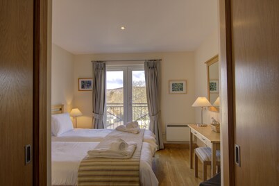 Top-floor, two-bedroom golf apartment with views over the famous James Braid Brora Golf Course