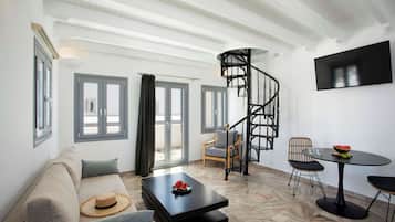Armonoia Captain's Villa Heated Tub. | Living area | Flat-screen TV
