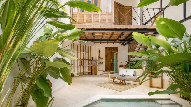 A pool area with a hot tub, surrounded by lush greenery and a wooden deck. - BA Villa 9 1 BR Villa 800m to Echo bea Elegant 1-br Villa With Pool 800m to Echo Beach (Pererenan)