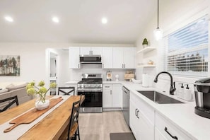Fridge, microwave, oven, stovetop - Freshly Updated Hideaway in CDA’s Best Spot (Coeur d'Alene)