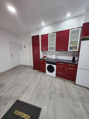 Fridge, microwave, toaster, cookware/dishes/utensils