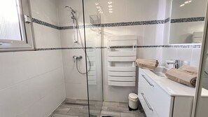 Hair dryer, bidet, towels, soap