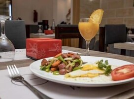 Daily continental breakfast (USD 12 per person)