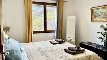 2 dormitorios, tabla de planchar con plancha, wifi y ropa de cama
