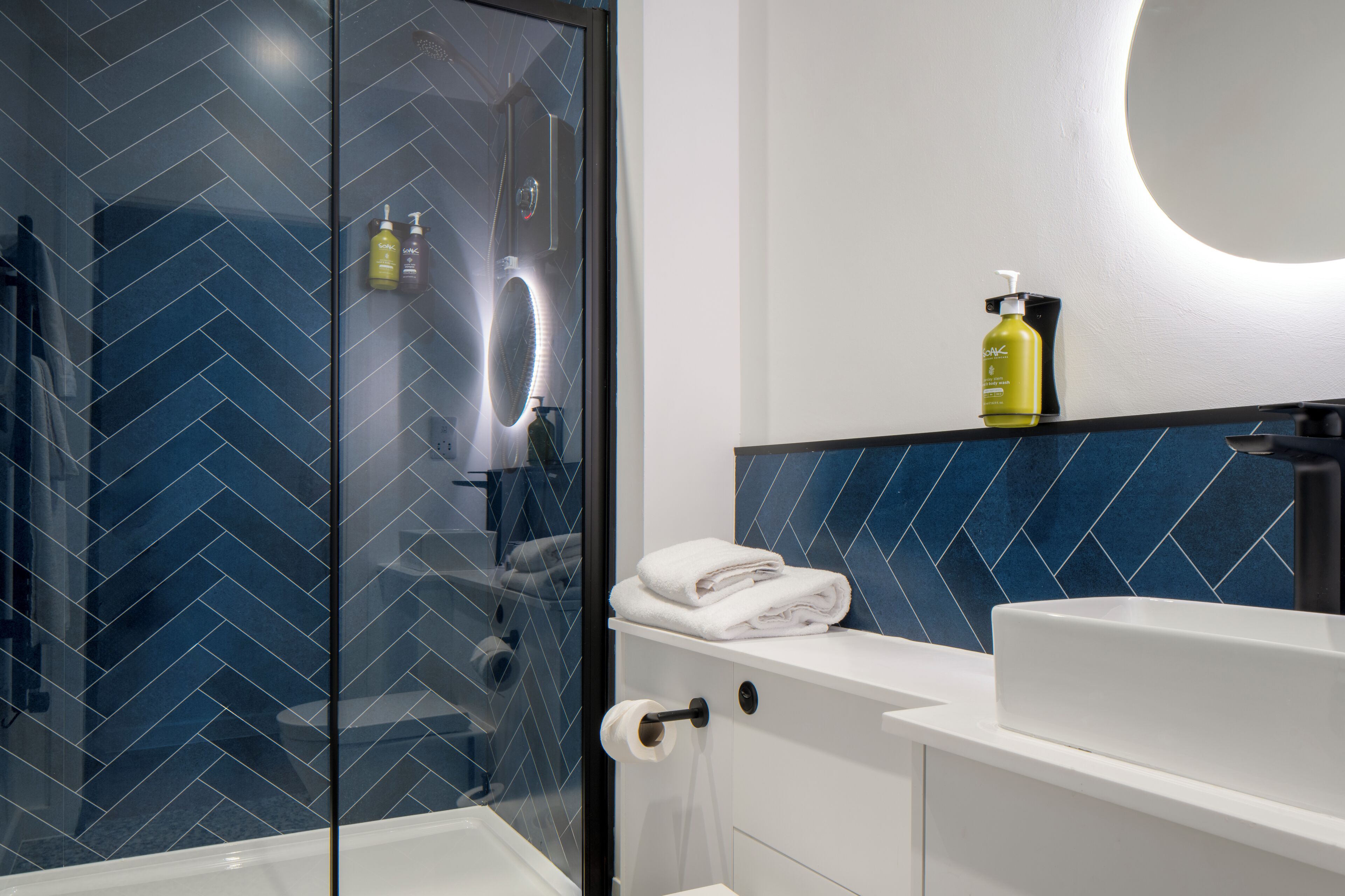 Shower, eco-friendly toiletries, hair dryer, towels