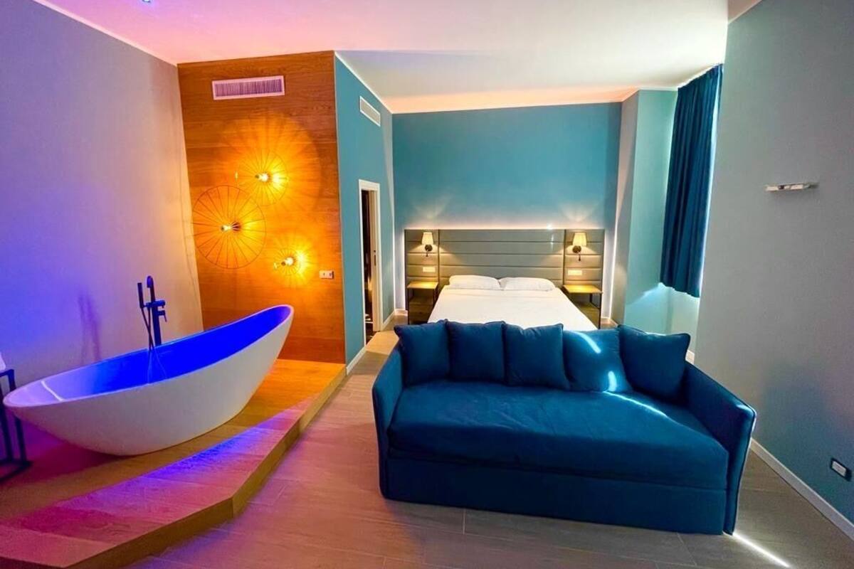 Chambre Quadruple Deluxe | Bureau, espace de travail pour ordinateur portable, Wi-Fi gratuit