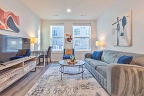 TV, offices - Luxury Apt with Rooftop Terrace and Pool (Waltham, MA)