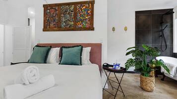 2 habitaciones, tabla de planchar con plancha, cuna de viaje y wifi