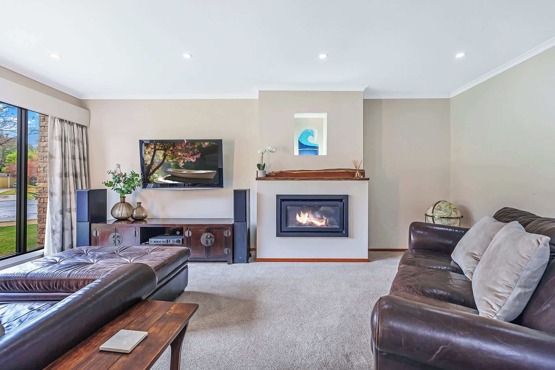 TV, fireplace, books, offices