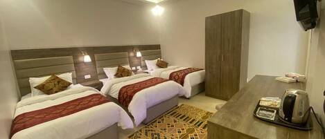 Triple Room | Free minibar items, desk, laptop workspace, free WiFi