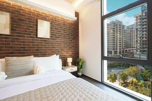 1 غرفة نوم ومكواة/لوح كي وخدمة الإنترنت وملاءات أسرّة