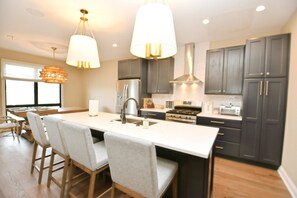 Fridge, microwave, oven, stovetop - Luxury Townhouse near Notre Dame with Fireplace & Pit (1418) (South Bend)