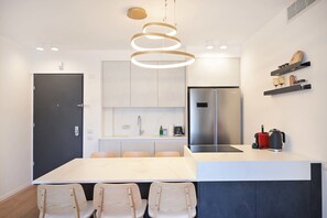 Fridge, microwave, oven, stovetop - Modern Bohemian 2BR in Nahalat Binyamin by Holyguest (Tel Aviv-Yafo)